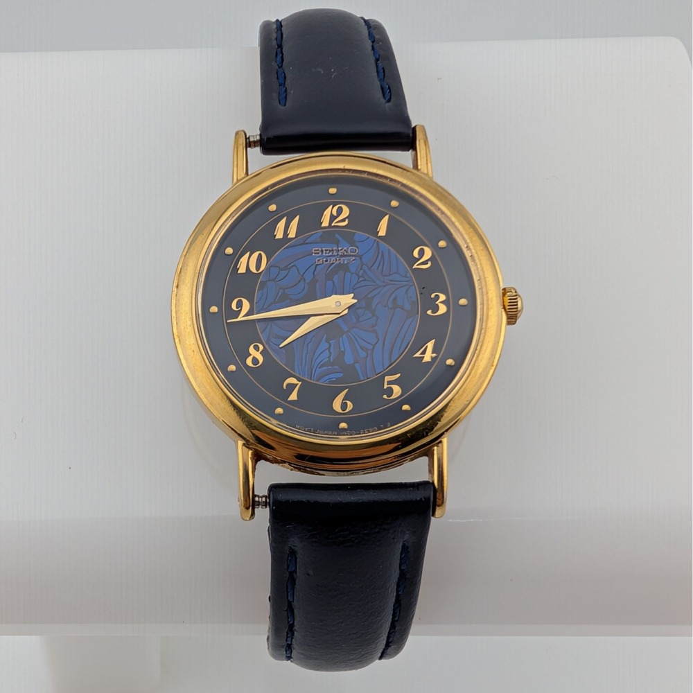 Seiko 1N00-0D59 Vintage Blue Floral Dial Gold Tone Quartz Watch Speidel Strap